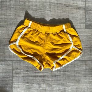 Yellow booty shorts.